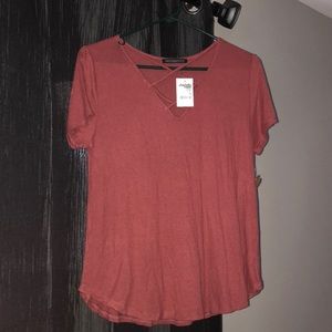 a wine color shirt, new with tags